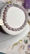 A light pink pearl bracelet decorated with transparent crystal beads, made of glass titanium steel, suitable for both men and women Item Picture
